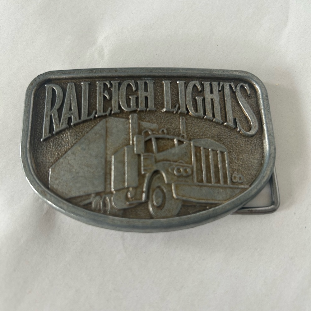 Silver-Tone Truck Belt Buckle Raleigh Lights